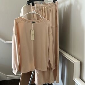 Brand new sweat pants and matching top with tag